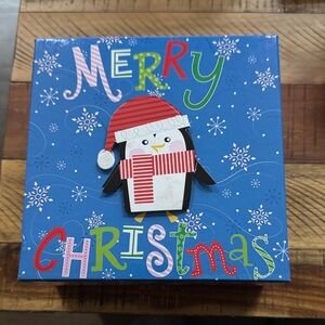 Blue Christmas Gift Box with Penguin Design